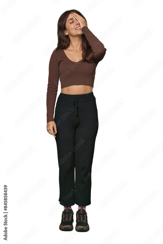 Middle Eastern woman, full body studio laughing happy, carefree, natural emotion. Middle Eastern woman, full body studio laughing happy, carefree, natural emotion.