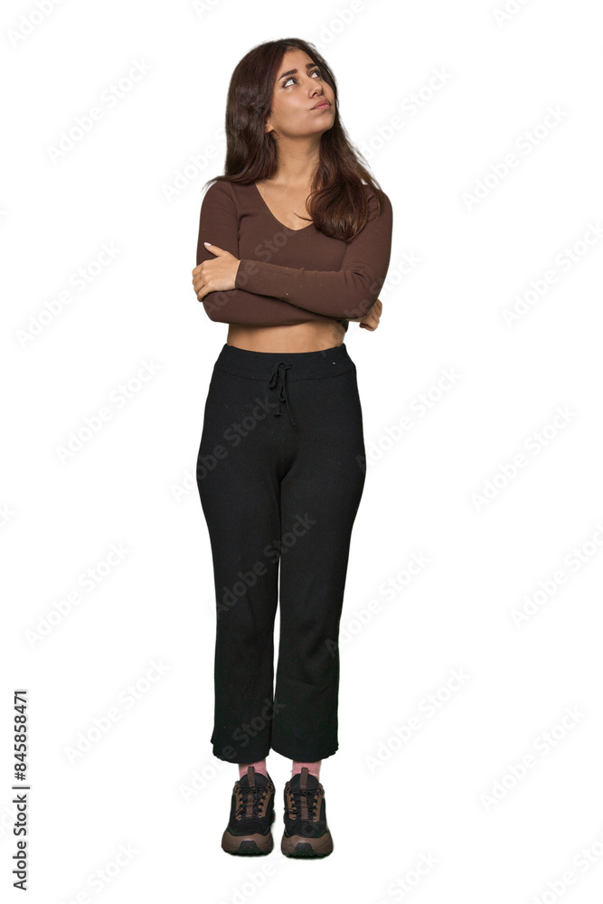 Middle Eastern woman, full body studio dreaming of achieving goals and purposes Middle Eastern woman, full body studio dreaming of achieving goals and purposes