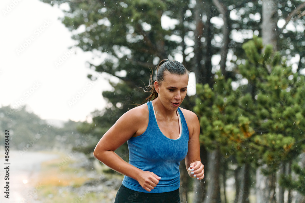 Unstoppable: A Determined Athlete Trains Through the Rain in Pursuit of Marathon Glory Unstoppable: A Determined Athlete Trains Through the Rain in Pursuit of Marathon Glory