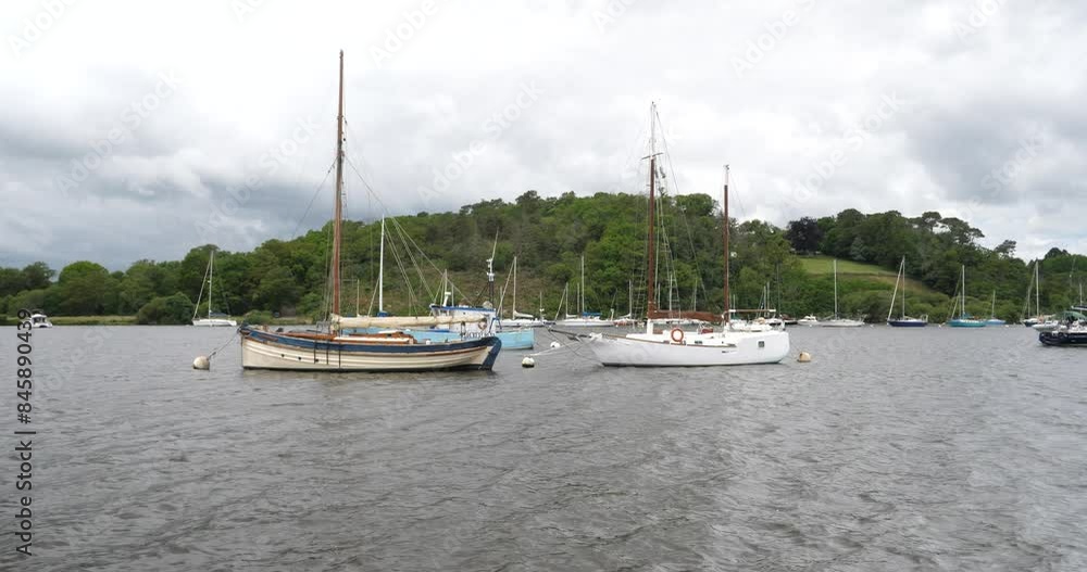 Some old boats moored in the Vilaine River. La Roche-Bernard, France - June 10, 2024. Some old boats moored in the Vilaine River. La Roche-Bernard, France - June 10, 2024.