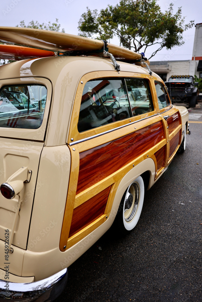 old fashioned woody style car with surfboards old fashioned woody style car with surfboards