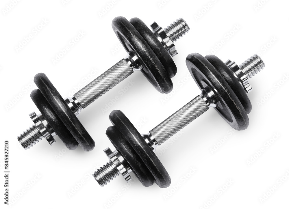 Metal dumbbells isolated on white, top view. Sports equipment Metal dumbbells isolated on white, top view. Sports equipment
