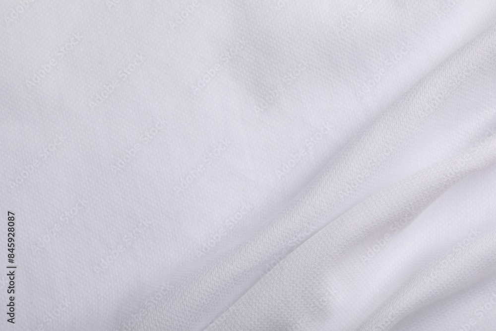 Fototapeta premium Texture of white fabric as background, top view