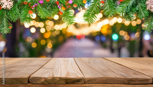 empty wooden table and pine tree leaves background for christmas
