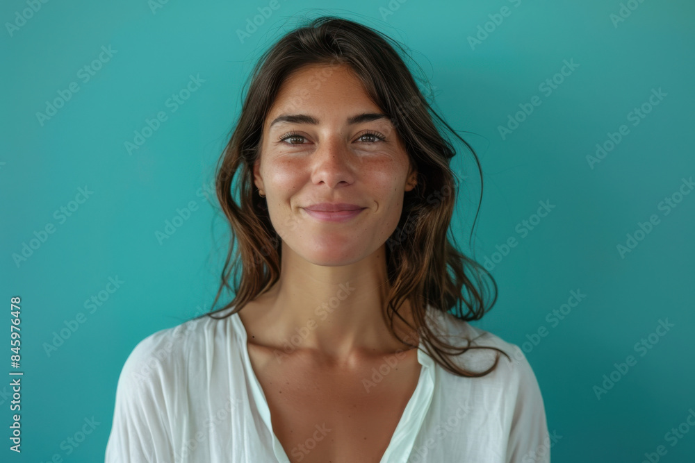 A close up portrait of a woman with a subtle smile A close up portrait of a woman with a subtle smile