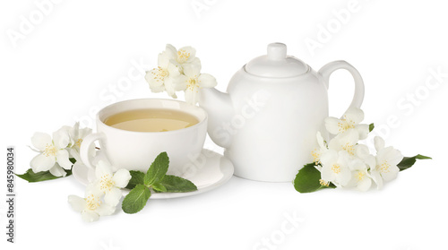 Aromatic herbal tea with mint and jasmine flowers isolated on white