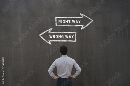 right way vs wrong way, good decision or mistake, businessman choosing strategy, critical thinking photo