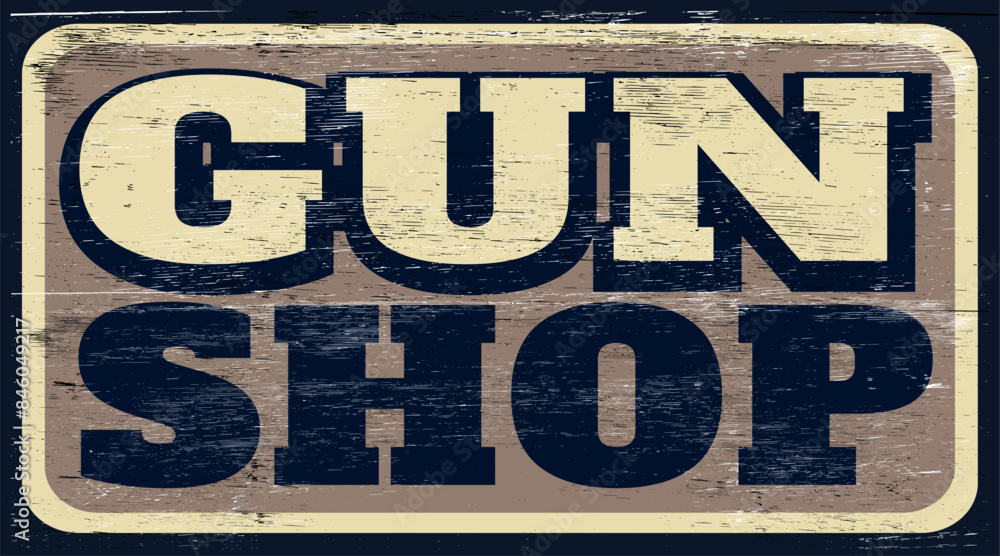 Aged and worn gun shop sign on wood