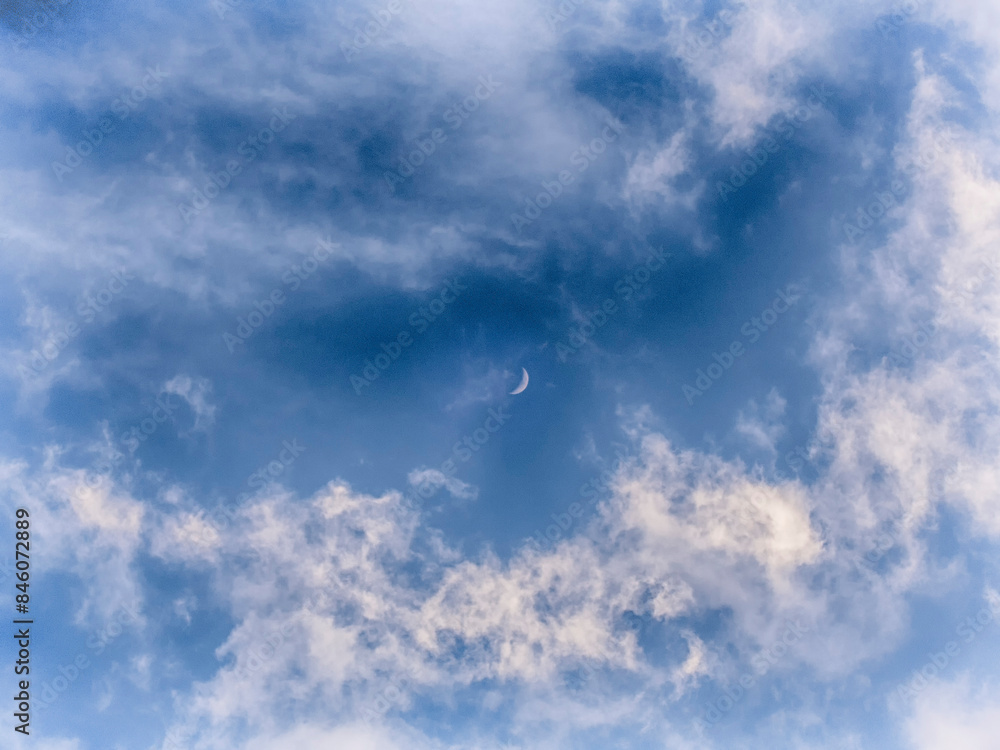 Fototapeta premium Moon among the clouds