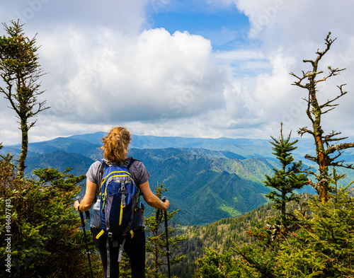Female Hiker Enjoying View From Cliff Top Viewpoint on Mt. LeConte, Great Smoky Mountains National Park, Tennessee, USA