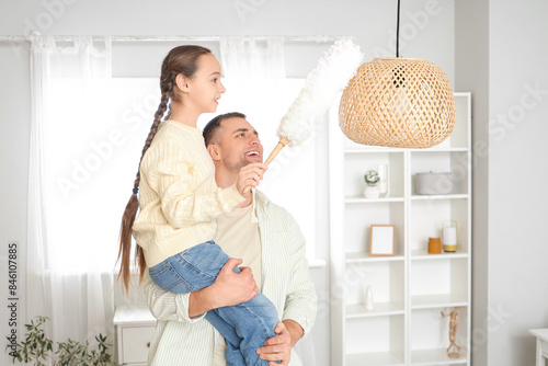 Father helping his daughter...