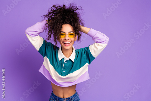 Photo of nice young girl touch hair empty space wear shirt isolated on violet color background