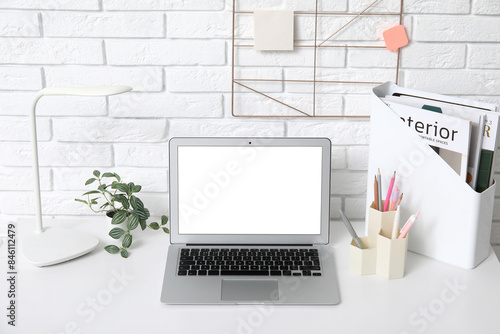 Modern workplace with lapto...