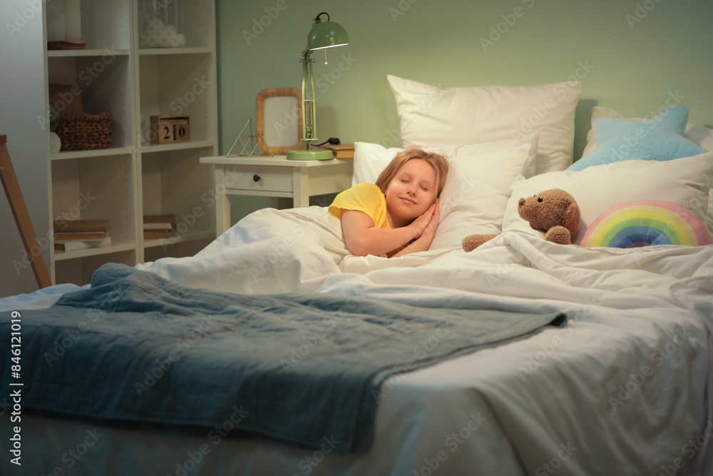 Adorable girl with teddy bear sleeping in cozy bed Adorable girl with teddy bear sleeping in cozy bed