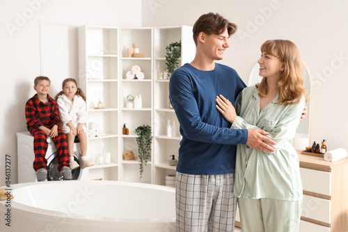 Happy parents with their li...