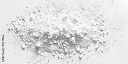  a pile of white flour. The flour appears to be in motion, creating a dynamic effect.