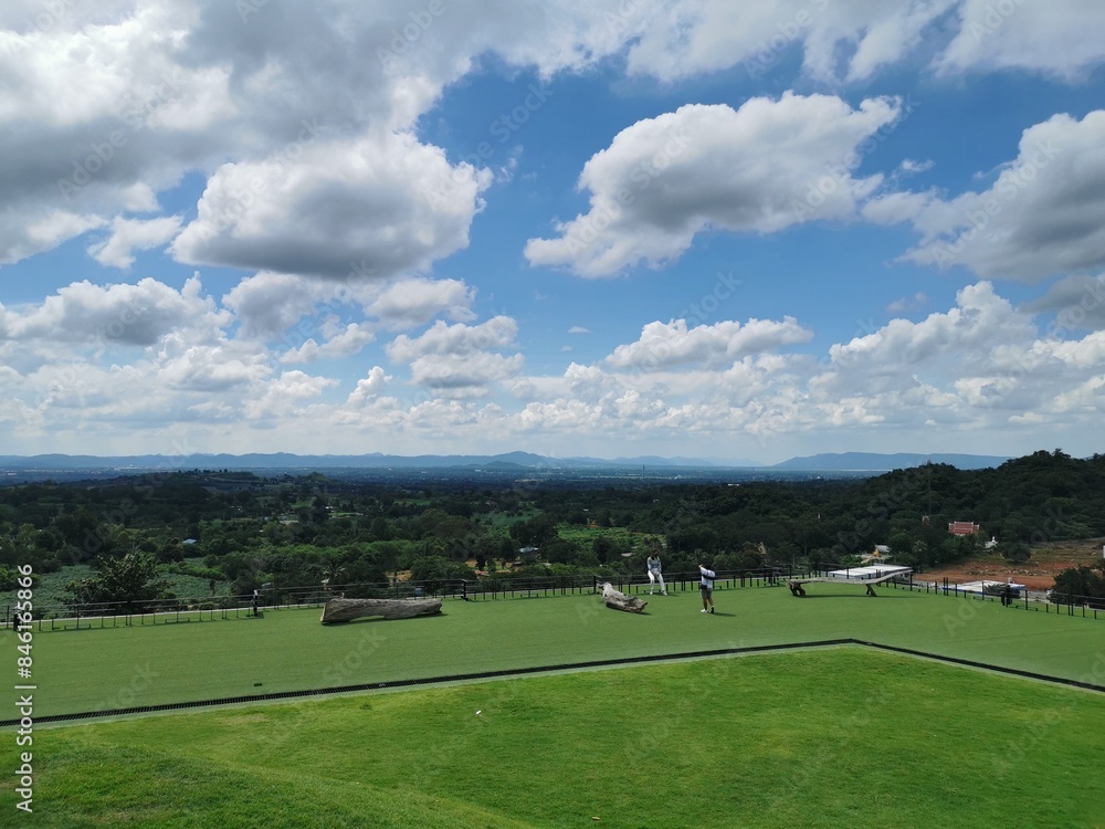 green grass course with clouds green grass course with clouds