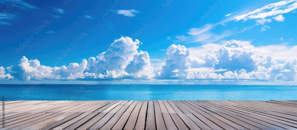 Captivating Scene of a Wooden Floor Against a Blue Backdrop of Sea and Sky