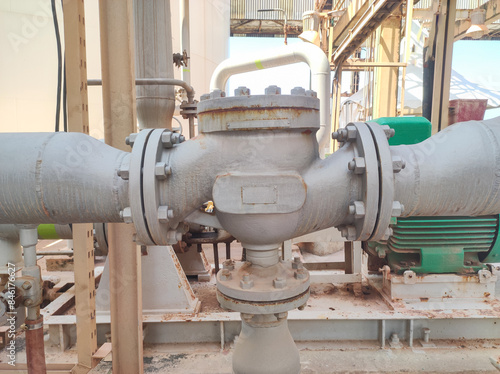 Photos The check valve functions to regulate the direction of fluid flow in industrial