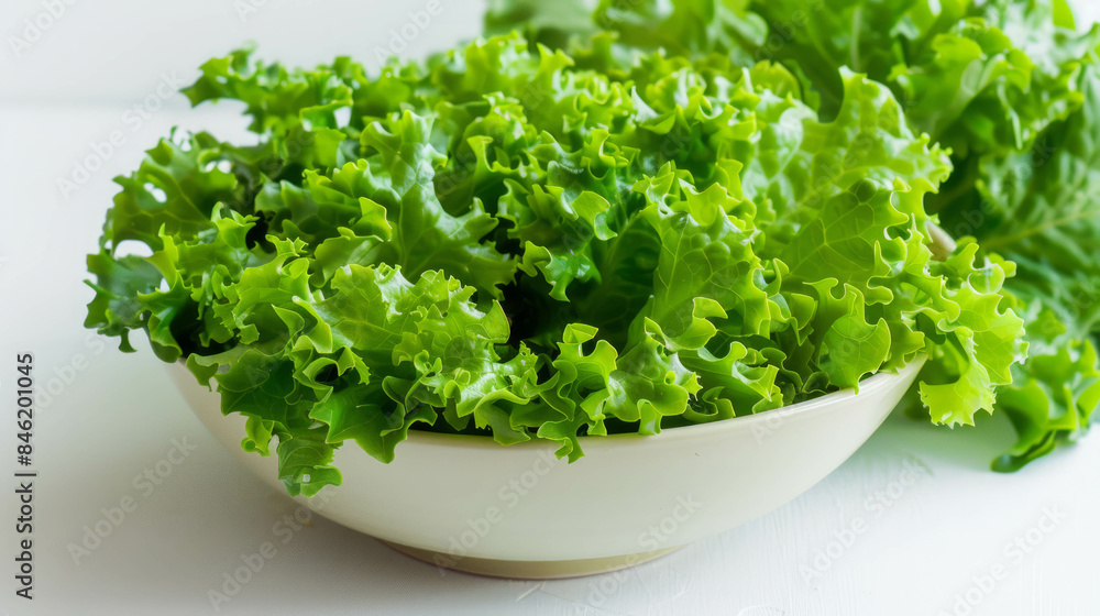 Fresh green lettuce leaves in a bowl, side view on white background. AI generative. Fresh green lettuce leaves in a bowl, side view on white background. AI generative.