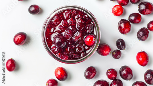 Product photo featuring cranberry jam in jar. AI generative.