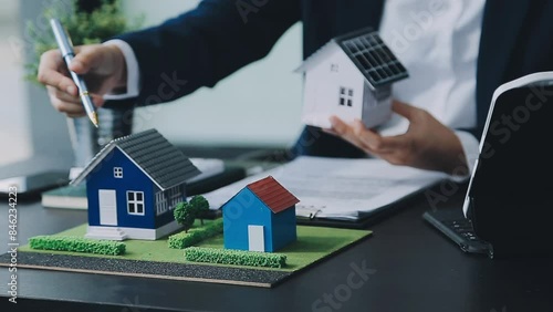 Wallpaper Mural Eco business company meeting with group of business people using laptop to plan strategy and discuss marketing of eco-friendly and clean energy products. Green business company concept. Trailblazing Torontodigital.ca