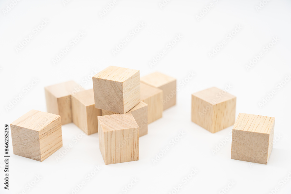 Wooden cube or wooden blocks isolated on a white background. Pile of wood block. Copy, empty space for text. Wooden cube or wooden blocks isolated on a white background. Pile of wood block. Copy, empty space for text.
