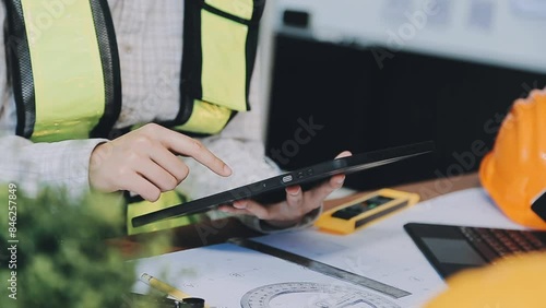 Wallpaper Mural Engineer Teamwork Meeting, Drawing working on blueprint meeting for project working with partner on model building and engineering tools in working site, Construction and structure concept.. Torontodigital.ca