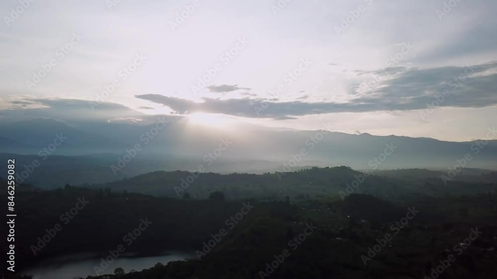 Scenic Sunrise Over The Rwenzori Mountains National Park In Western Uganda, Africa. Aerial Shot Scenic Sunrise Over The Rwenzori Mountains National Park In Western Uganda, Africa. Aerial Shot