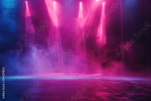 A stage with three lights and a lot of smoke