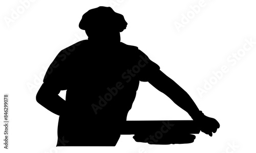 silhouette of chef rolling dough with rolling pin