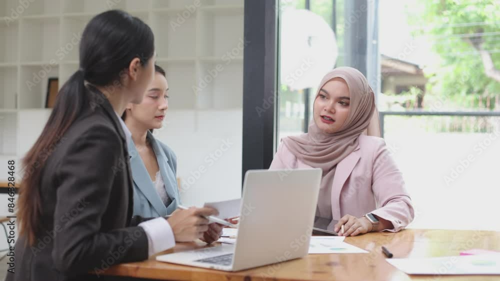 Team of Asian business people and working together in office, Startup projects and business presentation. Team of Asian business people and working together in office, Startup projects and business presentation.