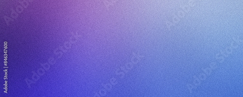 Abstract grainy blurred gradient background fading from purple to blue