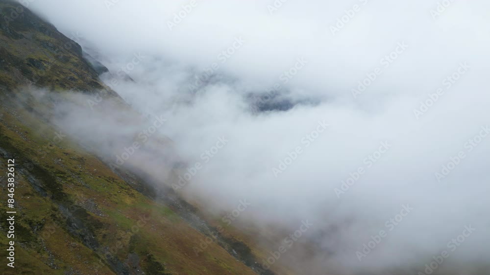 Aerial Pullback Highlands Mountain Slope Above the Clouds COPY SPACE Aerial Pullback Highlands Mountain Slope Above the Clouds COPY SPACE