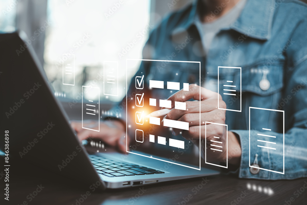 © Bussarin - Checklist and clipboard task documentation management Online survey, form checklist by laptop computer, Document Management Checking System, online documentation database and process manage files.