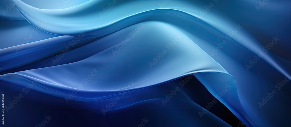 A beautifully illuminated blue fabric showcasing a wave pattern providing ample space for copying or adding text in the image A beautifully illuminated blue fabric showcasing a wave pattern providing ample space for copying or adding text in the image
