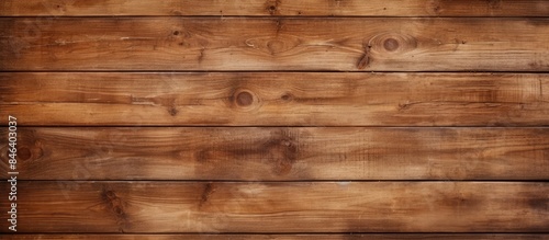 A copy space image showcasing the natural patterns of a textured brown wooden wall