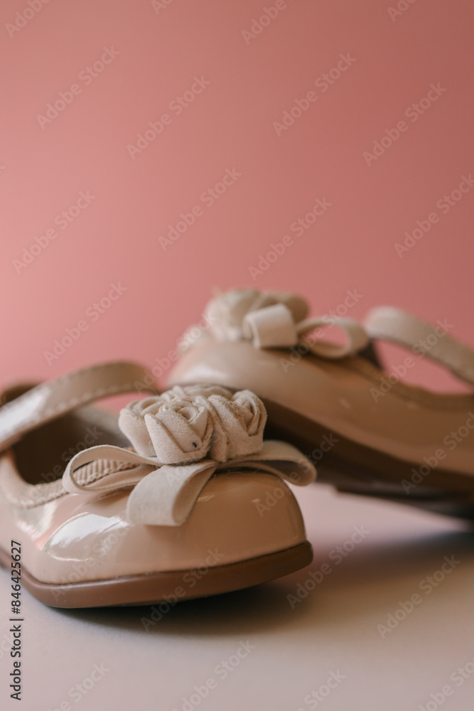 Beautiful shoes for a girl on a pastel background Beautiful shoes for a girl on a pastel background