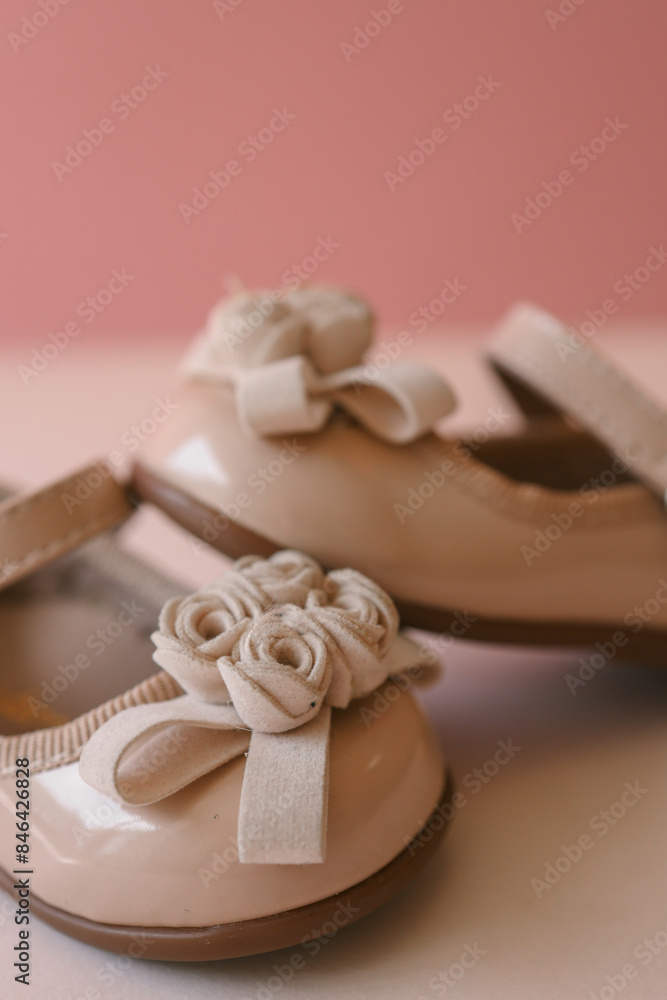 Beautiful shoes for a girl on a pastel background Beautiful shoes for a girl on a pastel background