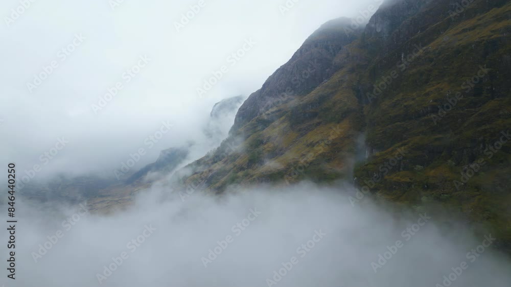 Overcast Sky and Dramatic Mountain Mist Aerial Dolly In Overcast Sky and Dramatic Mountain Mist Aerial Dolly In