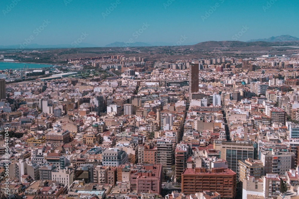 Fototapeta premium an aerial view of the city of barcelona, with a lake in the distance