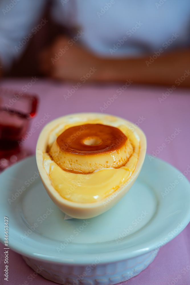 White plate with dessert and wine glasses White plate with dessert and wine glasses