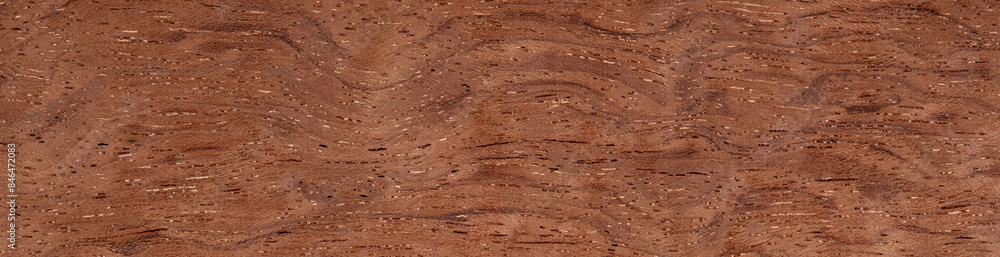 Bubinga pommele veneer with undulating grain patterns and warm terracotta tones