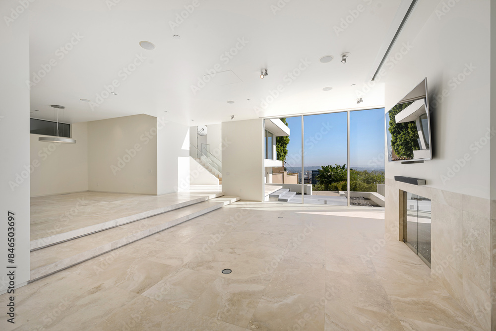 Fototapeta premium Living room with ocean view through large window