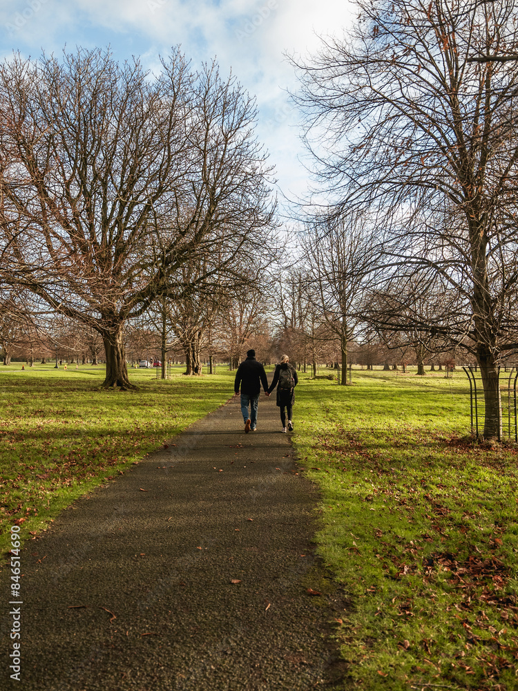 Couple walking in the park Couple walking in the park