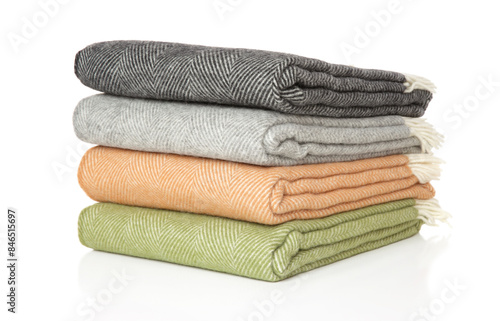 Four woolen plaids on white background