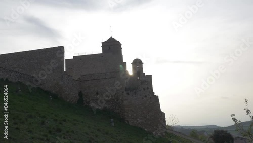 Benabarre medieval castle in Aragon, Spain, Europe in a summer afternoon at golden hour photo