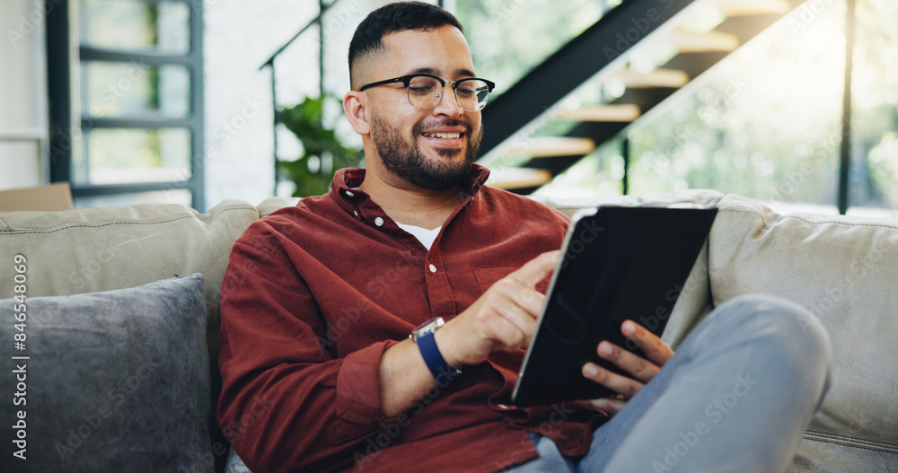 © Azeemud/peopleimages.com - Reading, glasses and happy man relax with tablet on sofa for social media, streaming and newsletter info at home. Digital, ebook and male person with app for subscription, research or service sign up © Azeemud/peopleimages.com - Reading, glasses and happy man relax with tablet on sofa for social media, streaming and newsletter info at home. Digital, ebook and male person with app for subscription, research or service sign up
