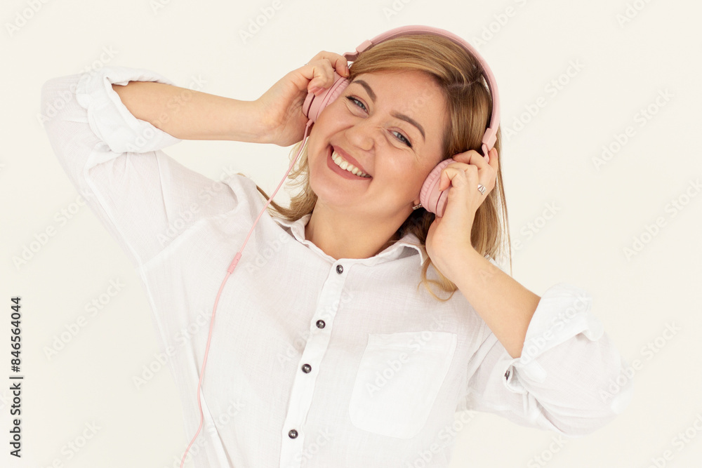 Photo of adorable sweet girl dressed white shirt enjoying songs headphones isolated white color background Photo of adorable sweet girl dressed white shirt enjoying songs headphones isolated white color background