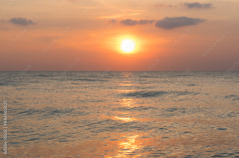 Background image of the beach in summer time. Beautiful sunrise or sunset sky over the sea at tropical beach in the morning or evening. copy space Background image of the beach in summer time. Beautiful sunrise or sunset sky over the sea at tropical beach in the morning or evening. copy space